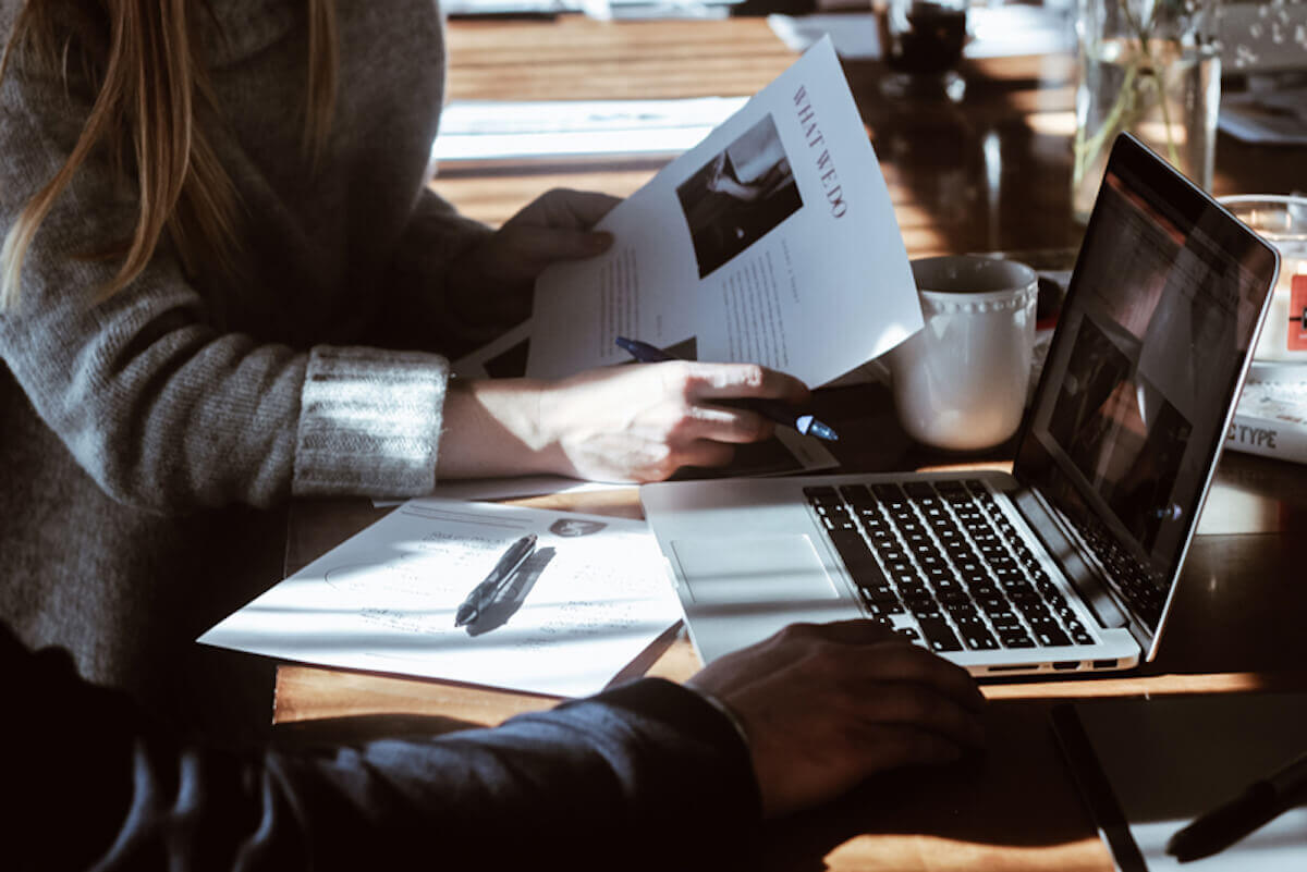 man and woman discussing client website